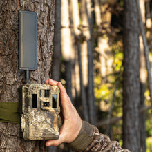Load image into Gallery viewer, Spartan GoLive 2 in Spartan Realtree Edge. This camo has a greenish tone with leaves and tree branches.